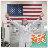 Person in lab coat holding products with American flag in background, showcasing Made in the USA.